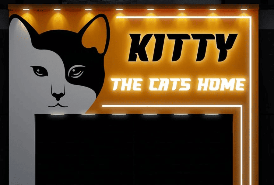 Sign for a cat-themed establishment